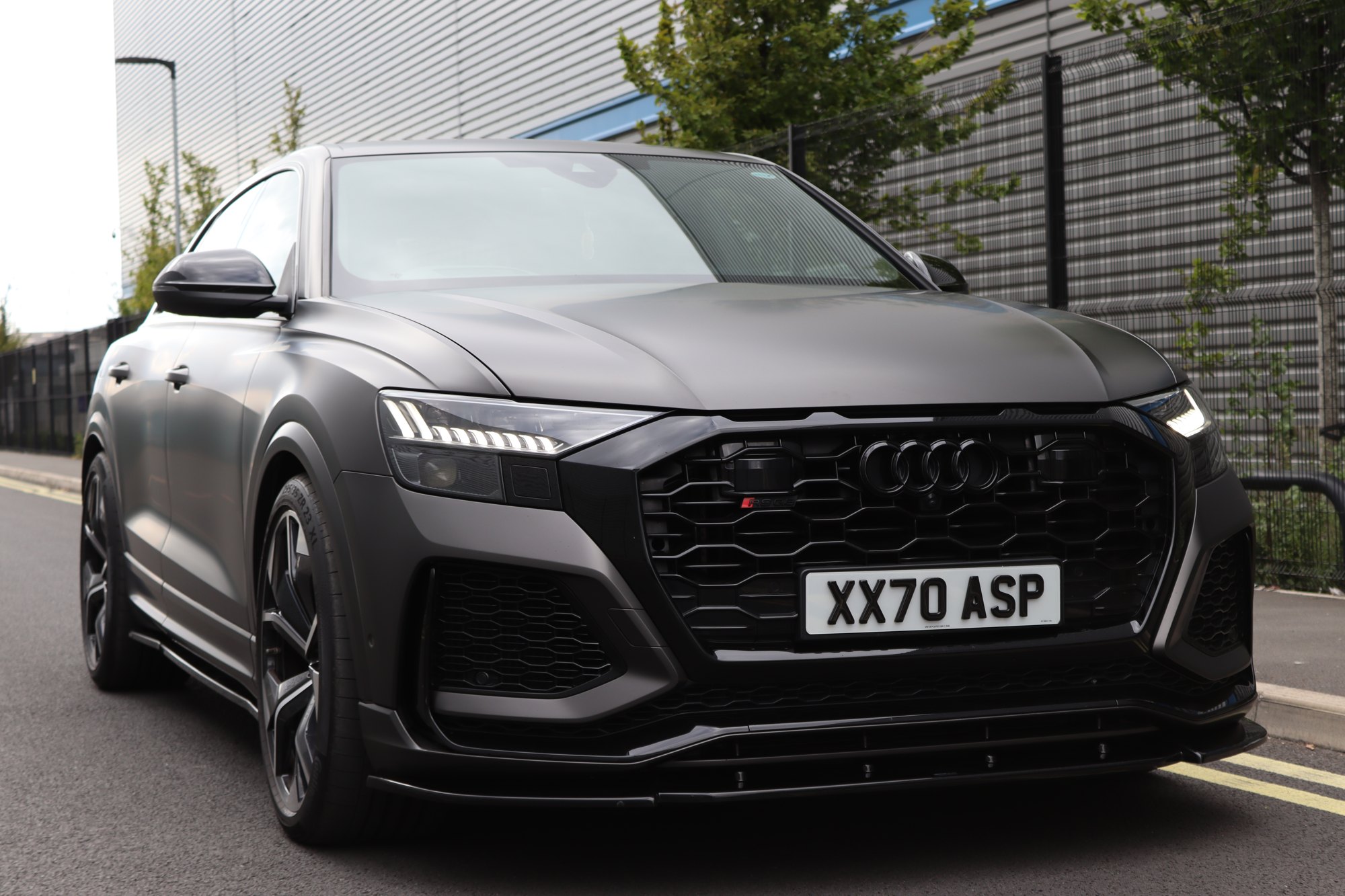 Front three-quarter view of an Audi RSQ8 wrapped in satin black by Auto Wrap Manchester