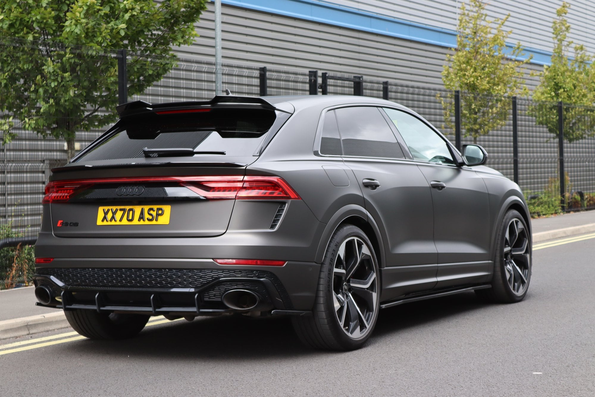 Rear view of an Audi RSQ8 wrapped in satin black, Trafford Park Manchester