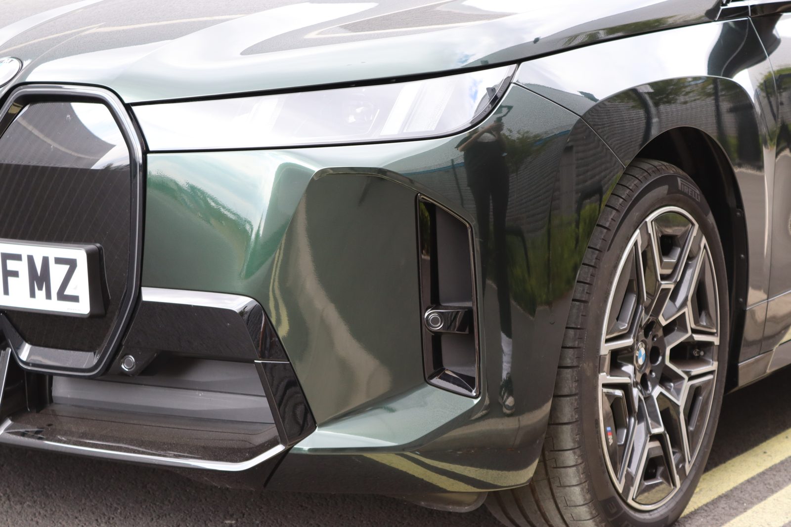 BMW iX wrapped in Racing Green at Auto Wrap Manchester