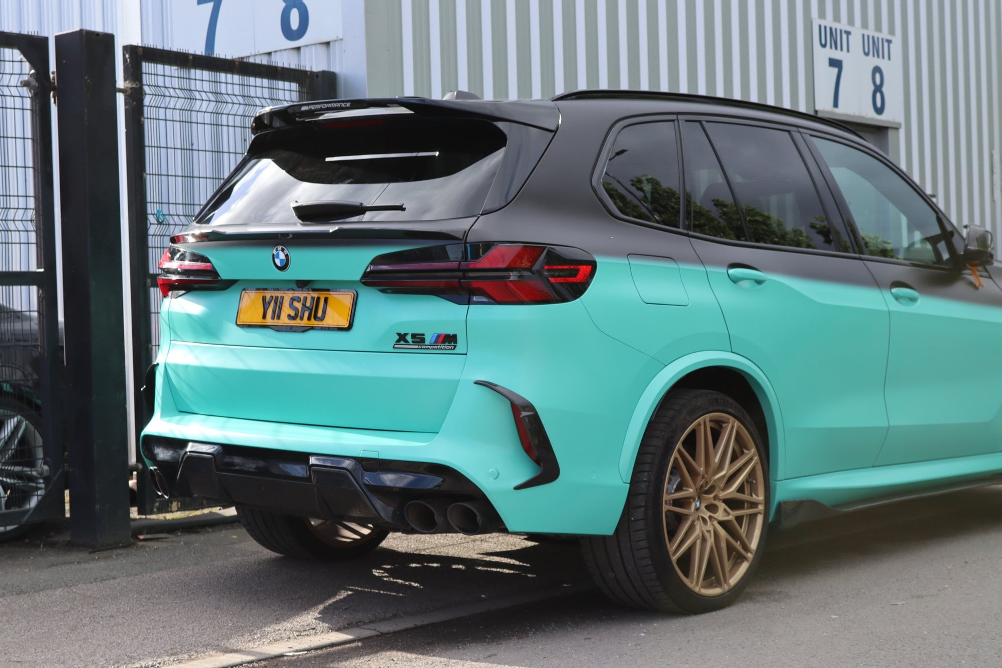 BMW X5 M in a Tiffany blue and satin black two-tone wrap by Auto Wrap Manchester