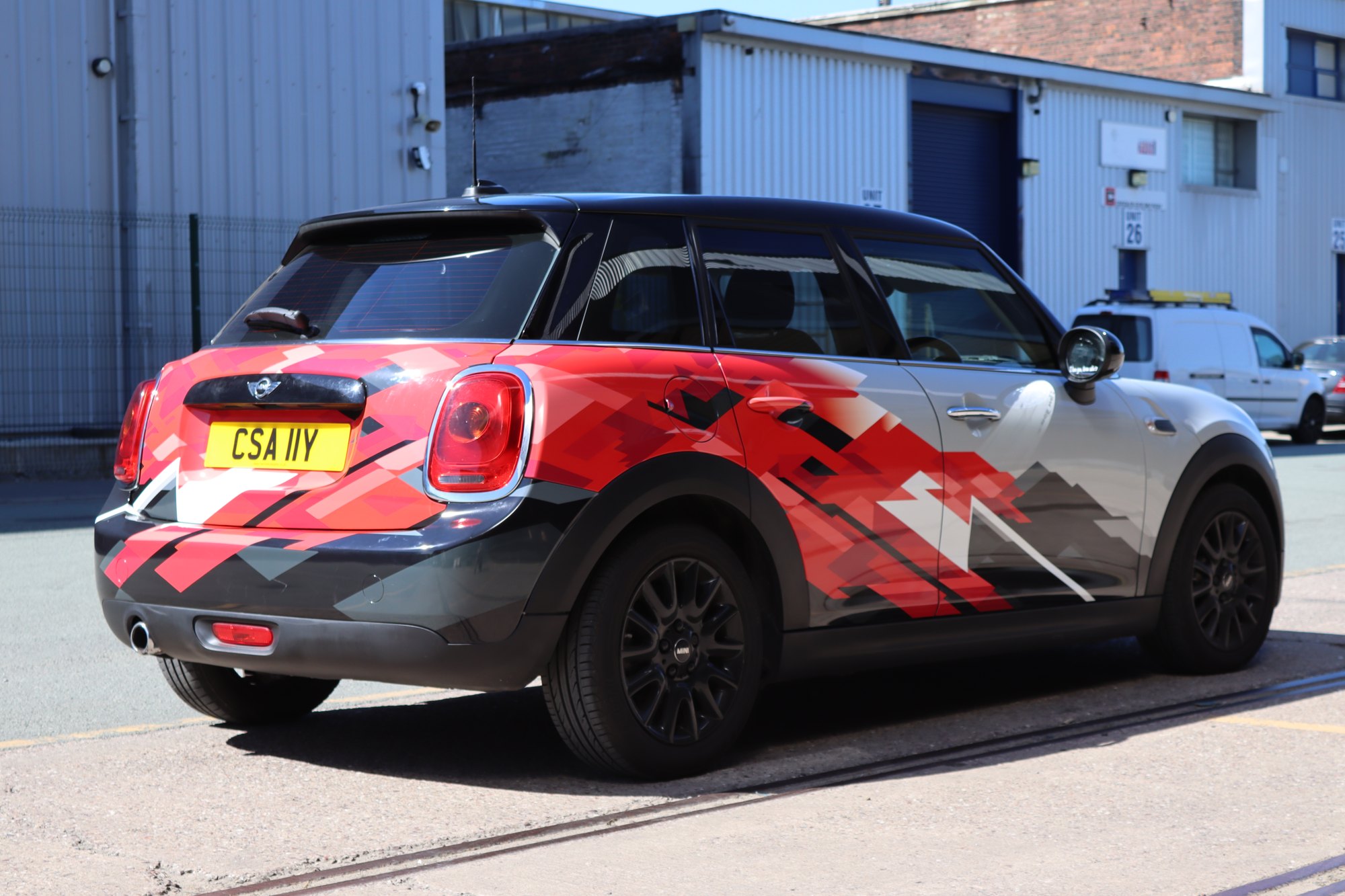 Cheshire Cycle Care Mini with printed red geometric part wrap by Auto Wrap Manchester