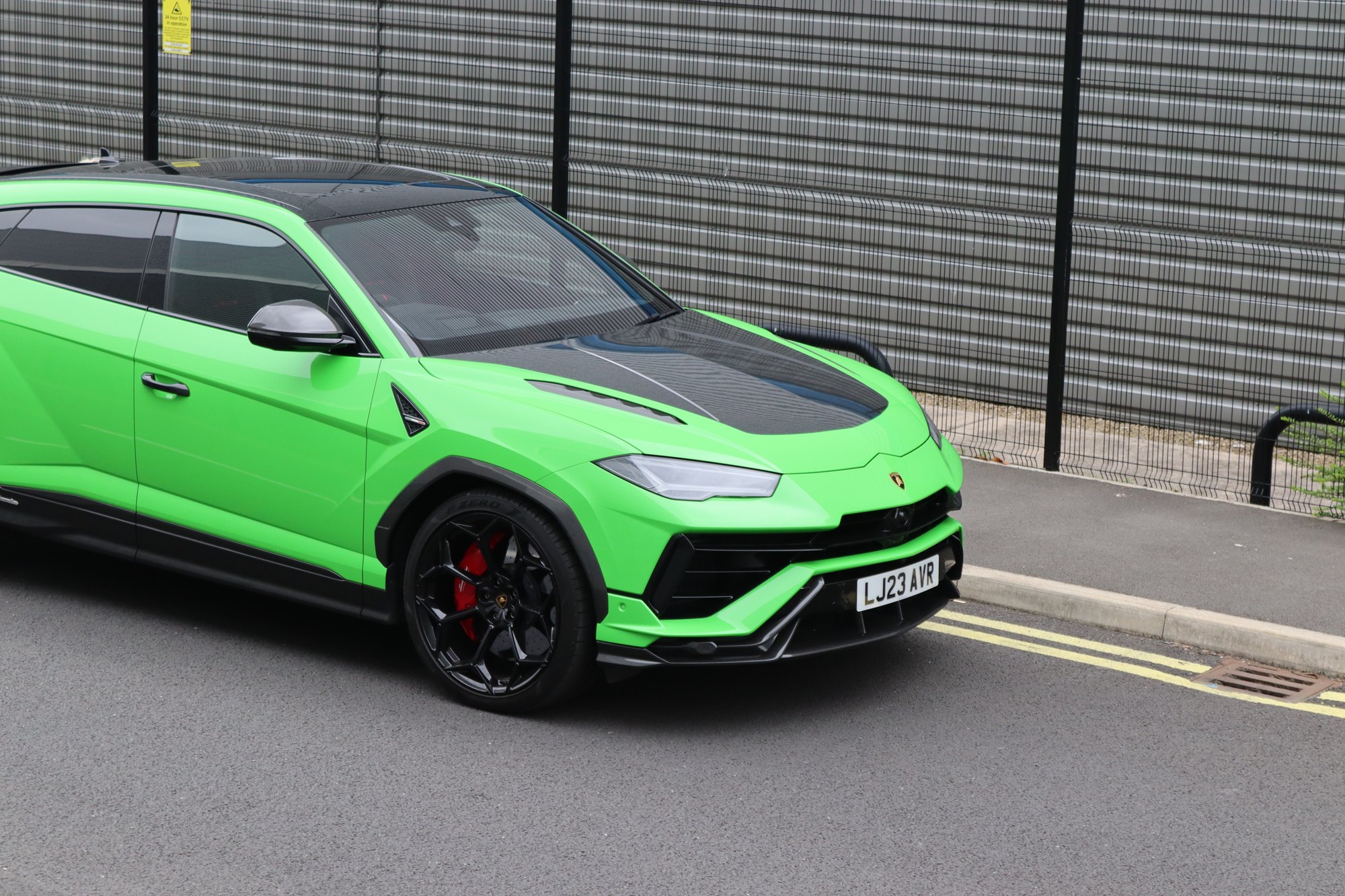 Lamborghini Urus wrapped gloss green with carbon bonnet, Trafford Park Manchester