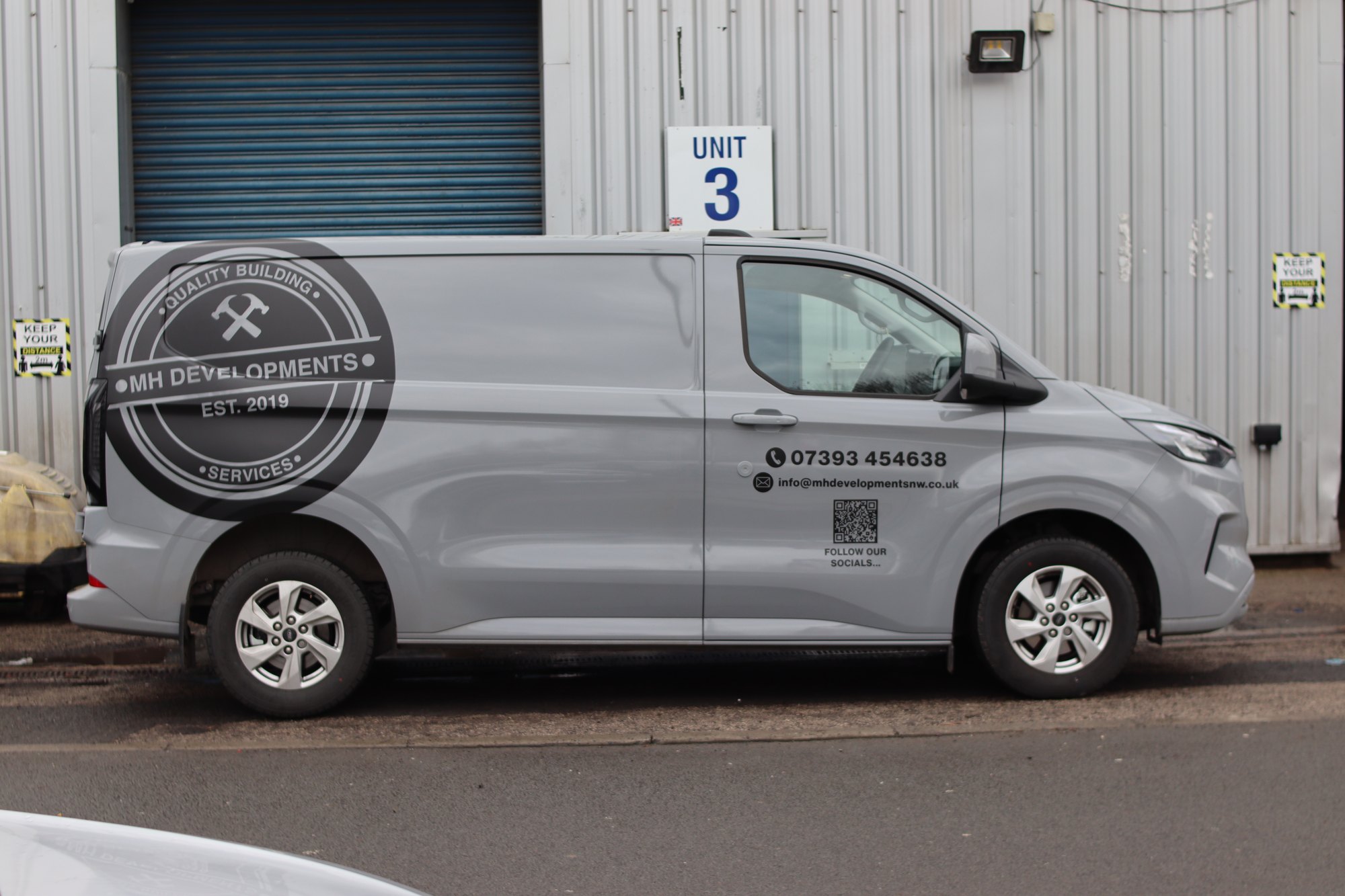 MH Developments Ford Transit Custom with cut vinyl signage by Auto Wrap Manchester