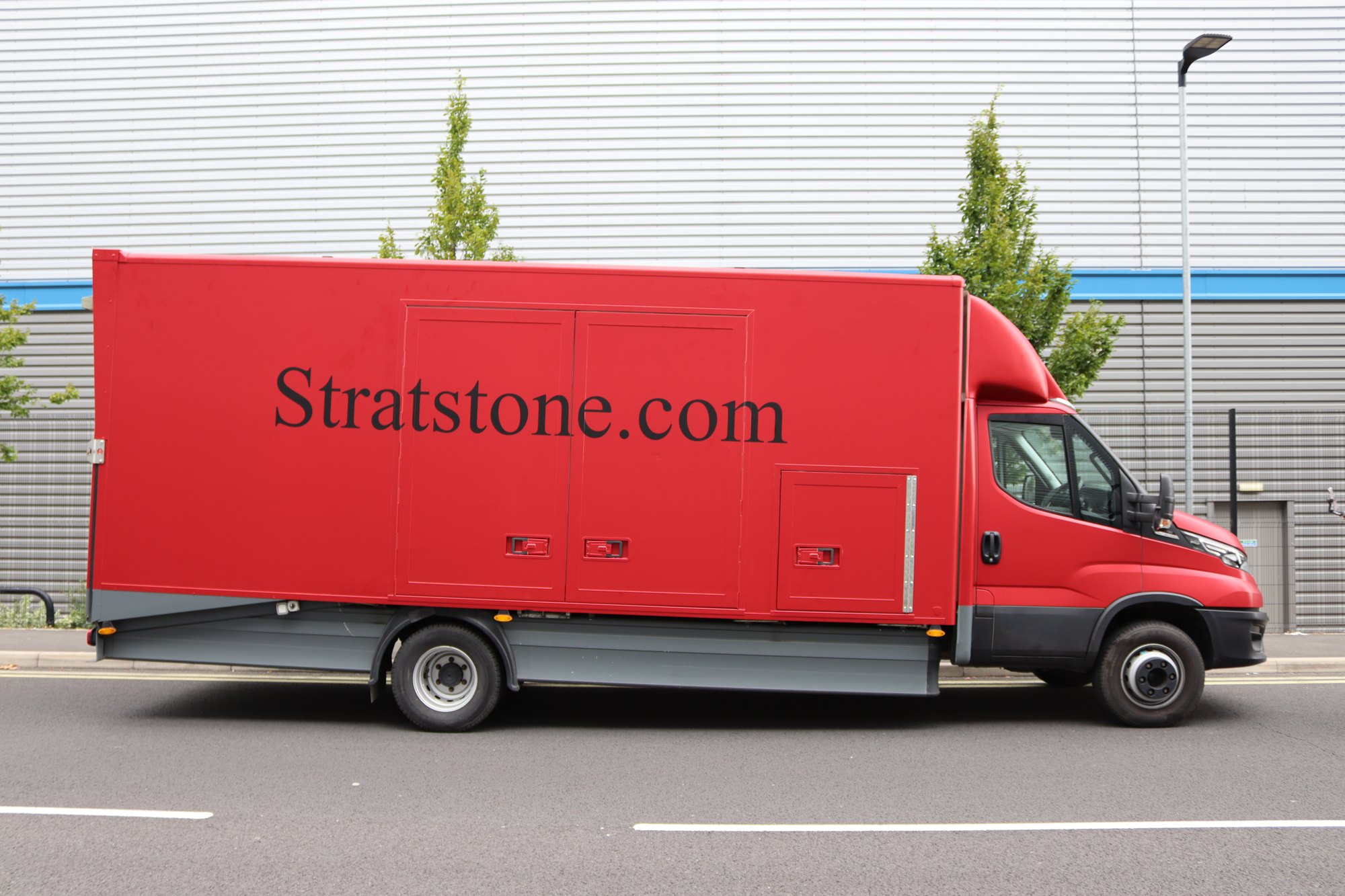 Stratstone.com Iveco box van full red wrap, side view, Manchester