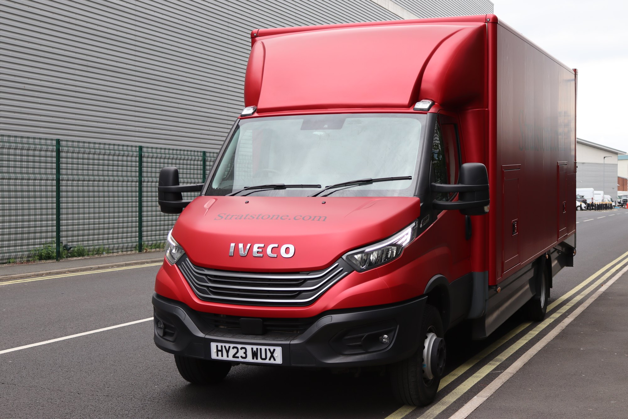 Stratstone Iveco box van in a full red wrap with cut vinyl lettering, Auto Wrap Manchester