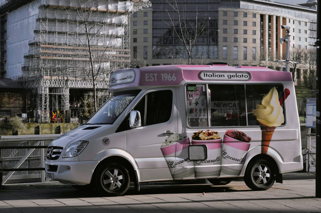 Ice cream van in a full printed livery on a city street